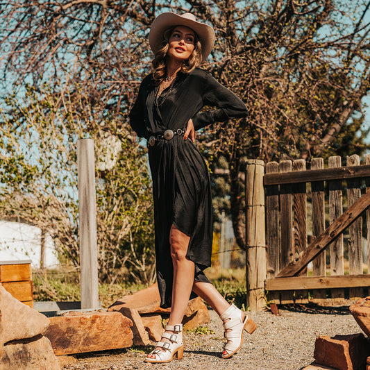 FREEBIRD women's Quail beige sandal with leather straps and working brass buckles lifestyle image