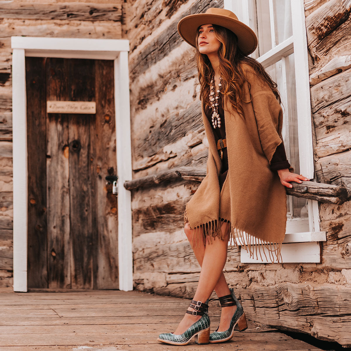 FREEBIRD women's Randi turquoise croco embossed leather open construction ankle strap heel with adjustable rustic buckles lifestyle image