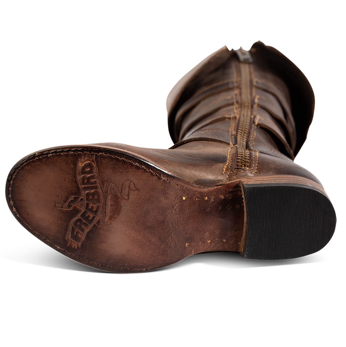 Leather sole imprinted with FREEBIRD on women's Risky brown fold-over tall boot