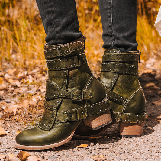 Freebird women's ROWDY green leather bootie with leather overlay details, stud embellishments and a mid sized heel