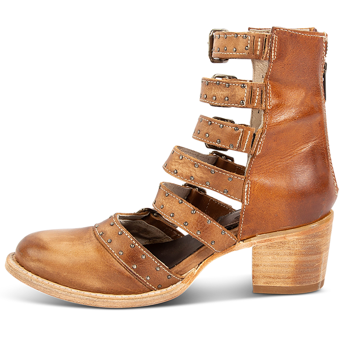Inside view showing a stacked heel, adjustable leather straps and embellishments on FREEBIRD women's Salty wheat leather bootie
