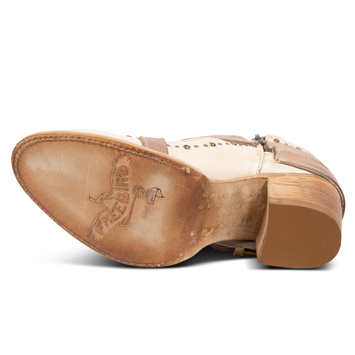 Leather sole imprinted with FREEBIRD on women's Samantha beige low heeled bootie