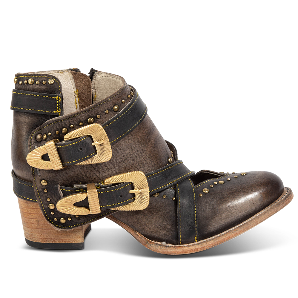 FREEBIRD women's Samantha black bootie with stud detailing, contrasting straps with gold hardware, and inside zip closure