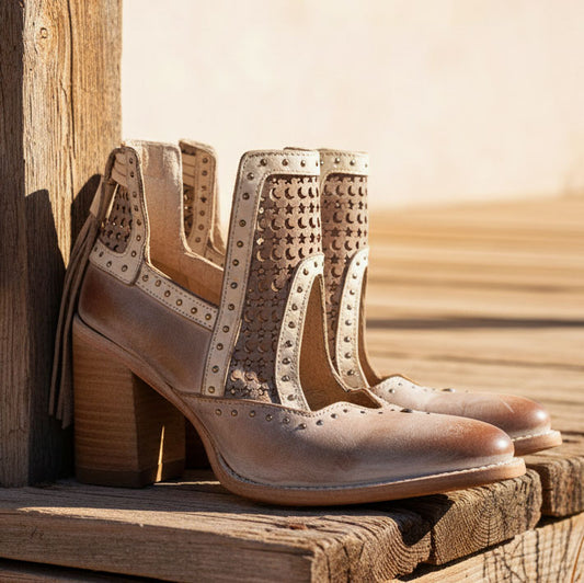 FREEBIRD women's Sharona blush laser cut bootie with wrapped heel and heel tassel detailing