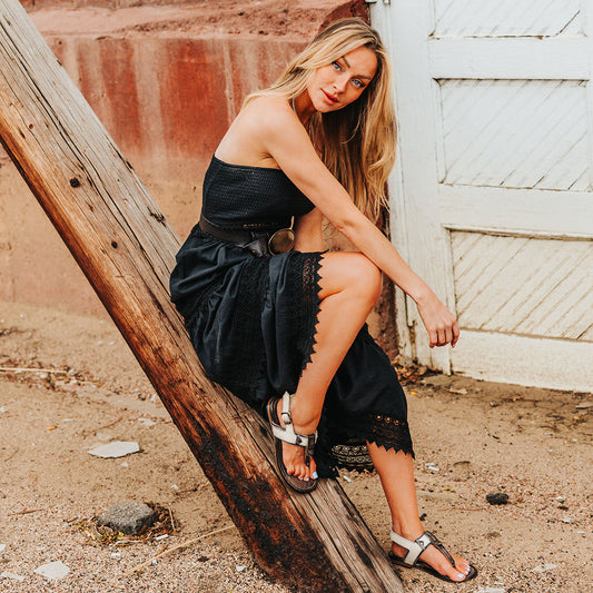 FREEBIRD women's Sorrento black multi leather sandal with an adjustable heel strap and slightly elevated heel lifestyle image