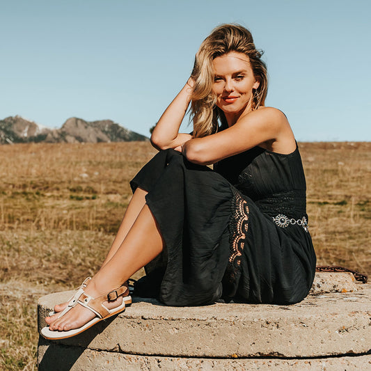 FREEBIRD women's Sorrento bone multi leather sandal with an adjustable heel strap and slightly elevated heel lifestyle image