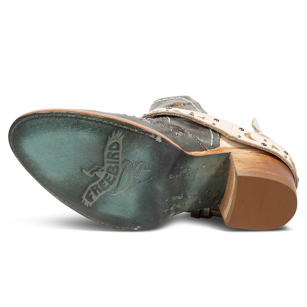 Leather sole imprinted with FREEBIRD on women's Stardom blue bootie
