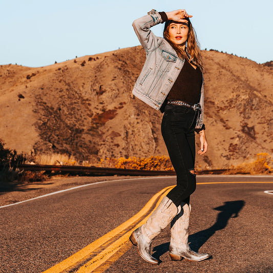 FREEBIRD women's Starzz beige leather cowboy boot with two-toned leather star inlay detailing traditional stitching and snip toe construction lifestyle image