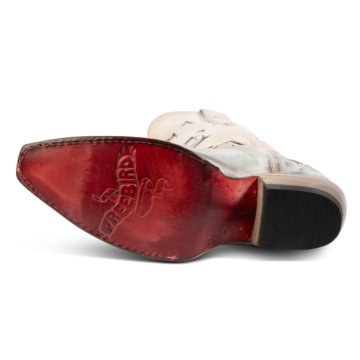 Red leather sole imprinted with FREEBIRD on women's Starzz beige western boot