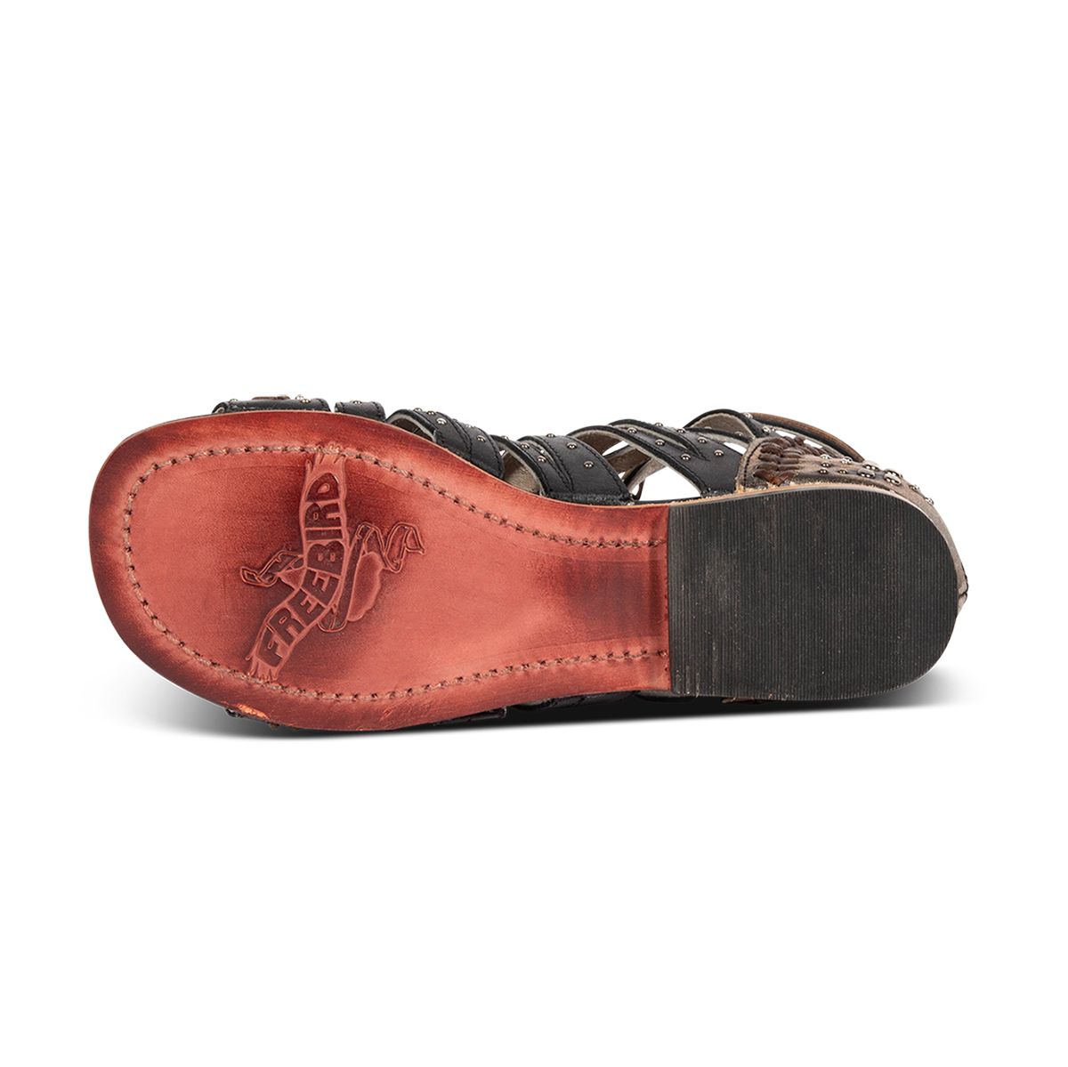 Leather sole imprinted with FREEBIRD on women's Swan black leather sandal