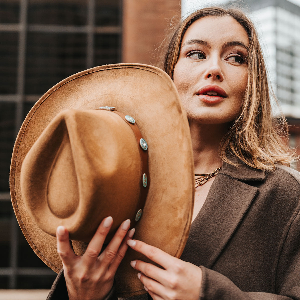 FREEBIRD Wesson camel distressed cowboy hat featuring teardrop crown, western curved brim, and turquoise metal detailing