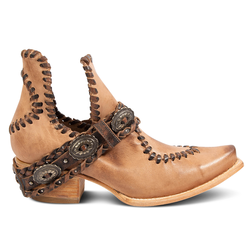 FREEBIRD women's Whimsical natural leather bootie with whip stitch detailing, leather braided belt and snip toe construction