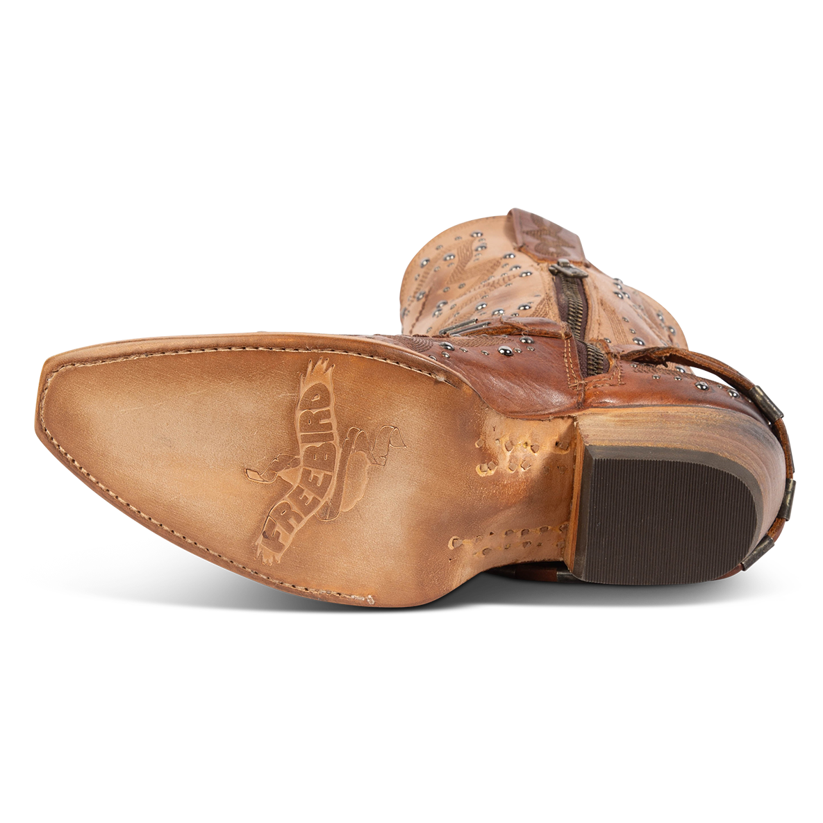 Leather sole imprinted with FREEBIRD on women's Wisteria tan boot