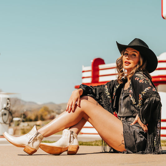 FREEBIRD women's Wolfie beige leather bootie with stitch detailing and snip toe construction lifestyle image