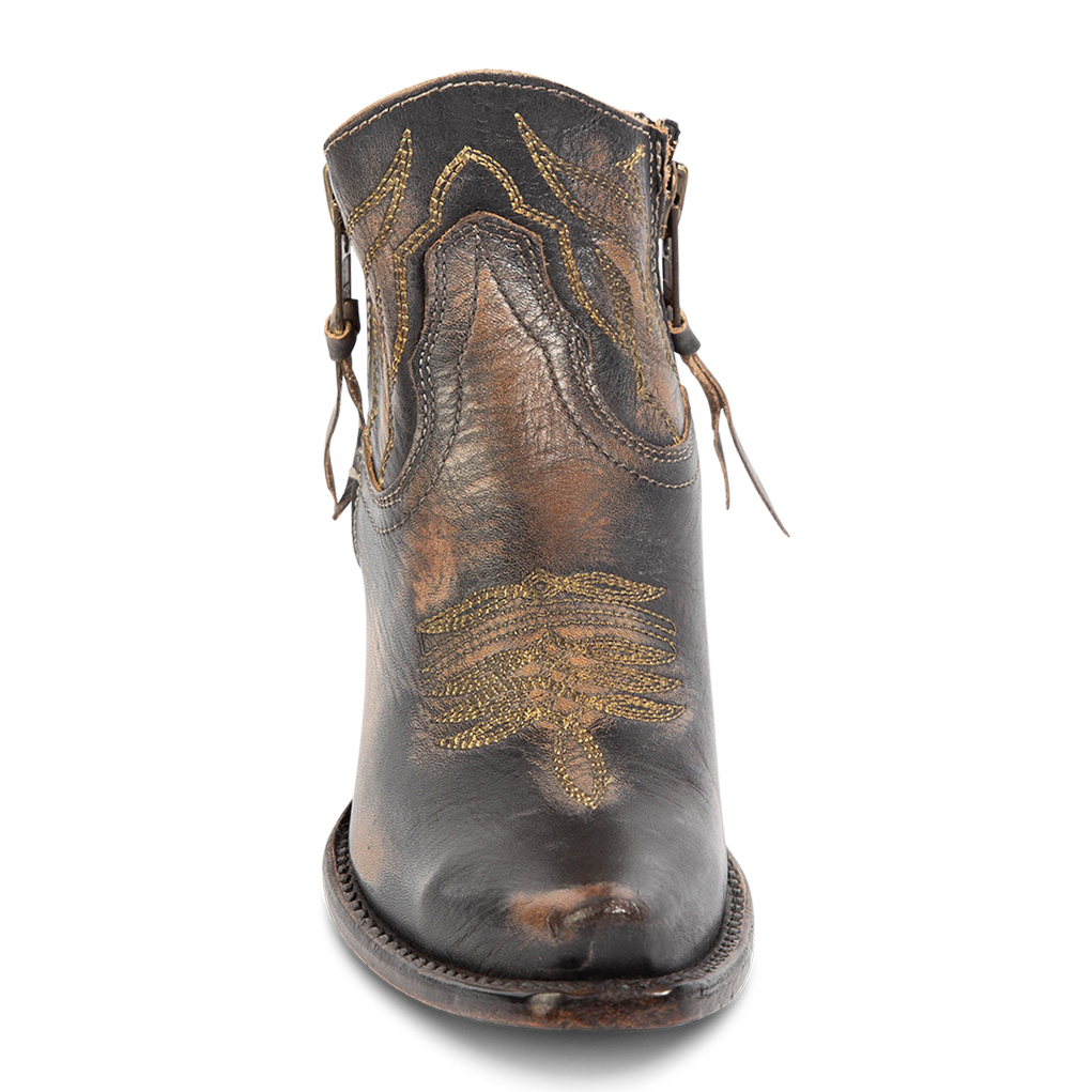 Front view of FREEBIRD women's Wolfie black leather bootie with stitch detailing, snip toe construction and symmetrical brass zip closures