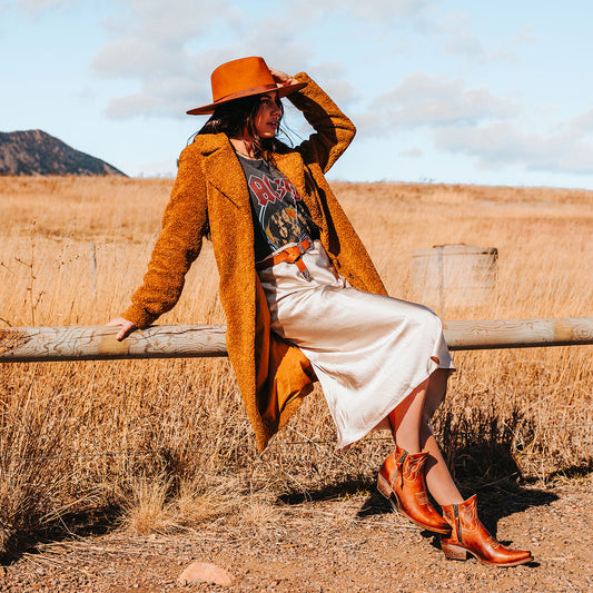 FREEBIRD women's Wolfie whiskey leather bootie with stitch detailing and snip toe construction lifestyle