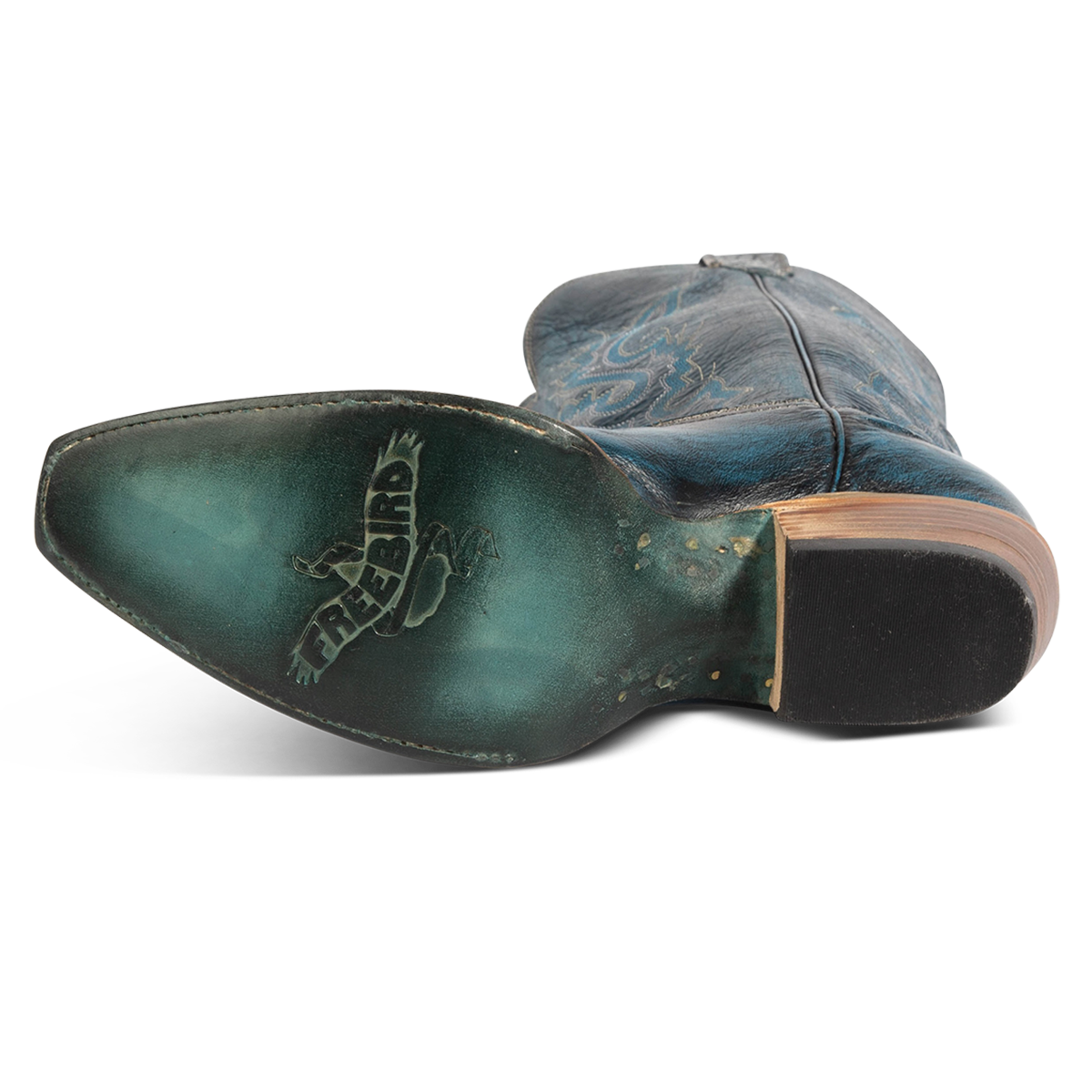 Leather sole imprinted with FREEBIRD on women's Woodland blue leather boot