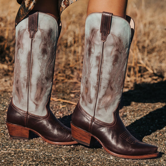 FREEBIRD women's WOODLAND patina multi leather western boots featuring a snip toe, decorative stitching, and traditional pull straps
