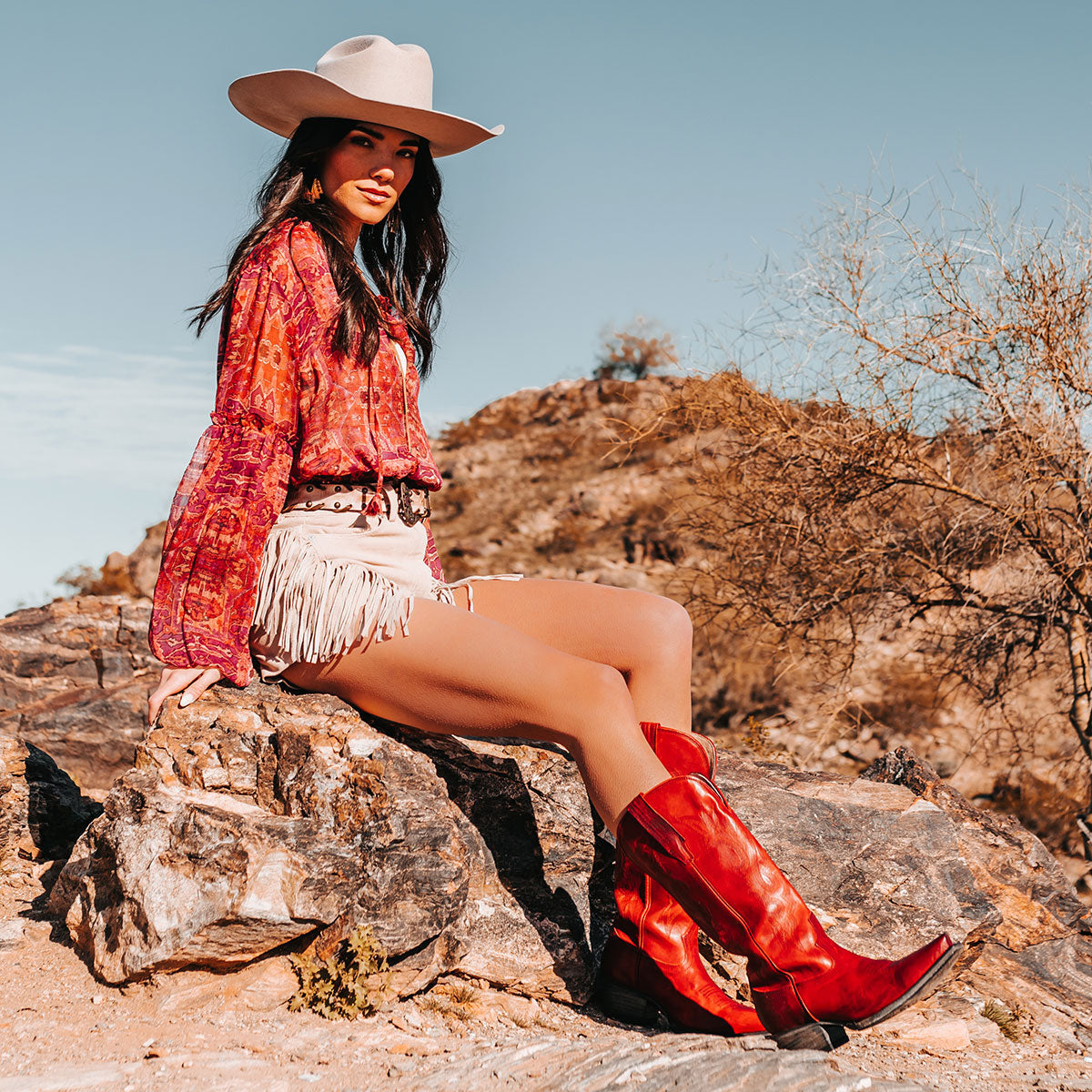 FREEBIRD women's Woodland red leather cowboy boot with stitch detailing and snip toe construction lifestyle image