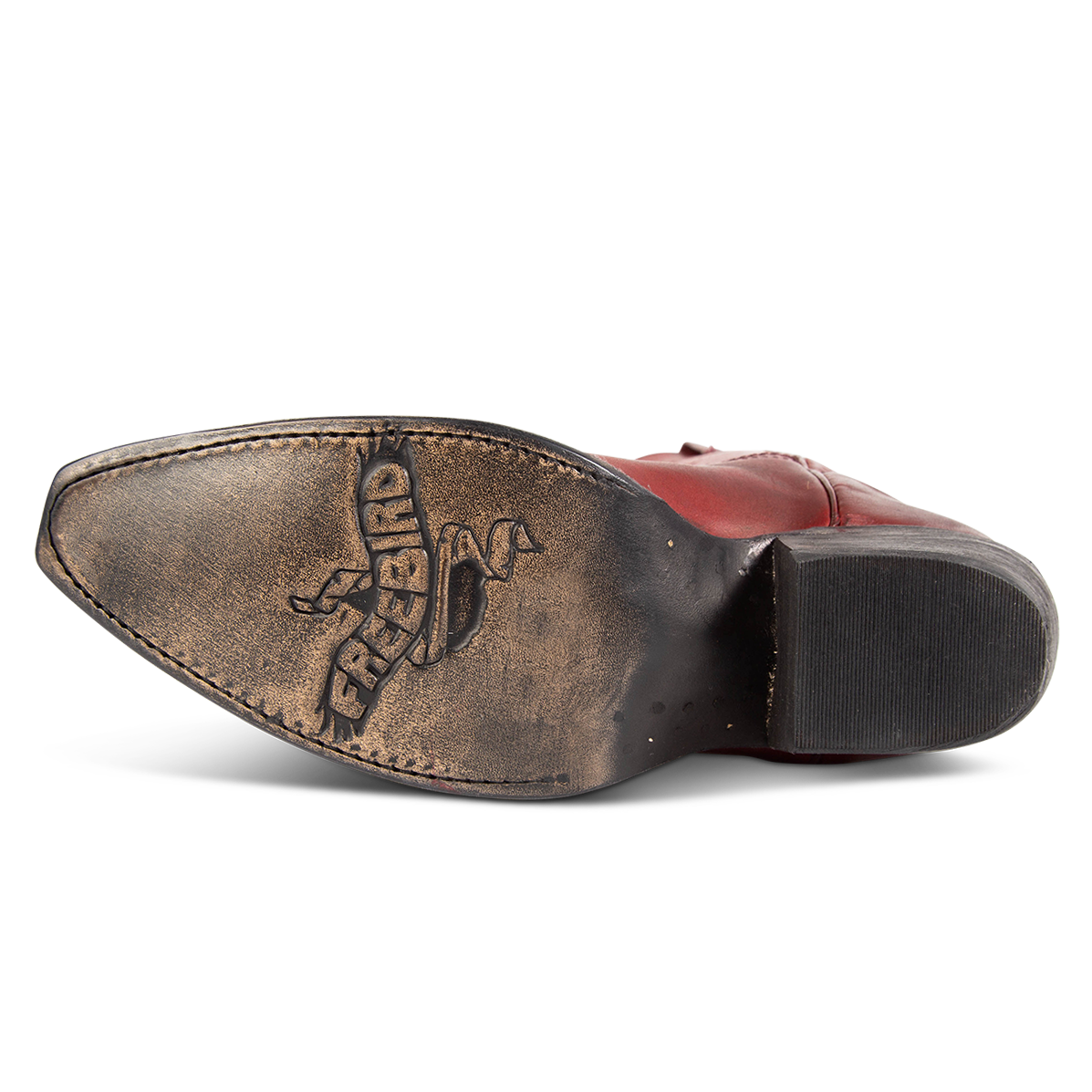 Leather sole imprinted with FREEBIRD on women's Woodland red leather boot