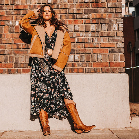 FREEBIRD women's Woodland tan leather cowboy boot with stitch detailing and snip toe construction lifestyle image