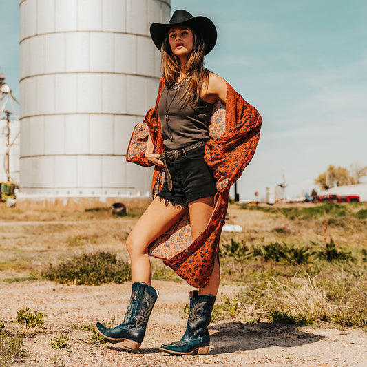 FREEBIRD women's Woody blue leather boot with stitch detailing and snip toe construction lifestyle image