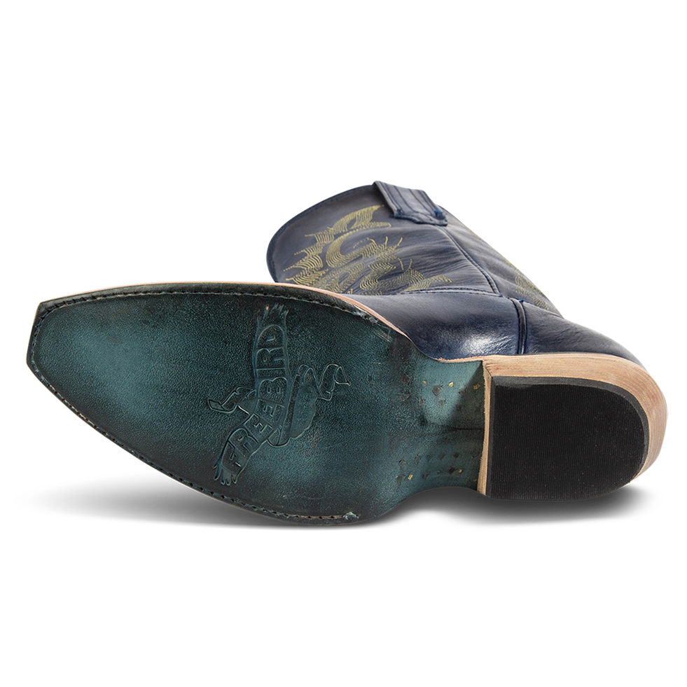 Leather sole imprinted with FREEBIRD on women's Woody blue leather boot
