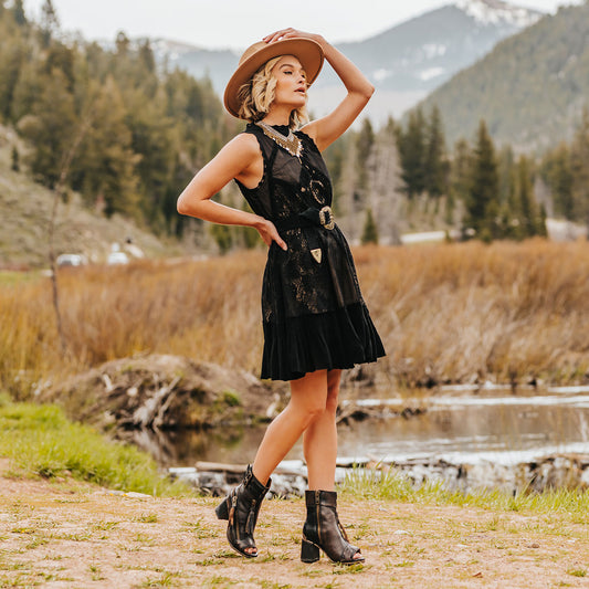 FREEBIRD women's Zombi black sandal with zip and buckle leather detailing and stacked heel lifestyle image