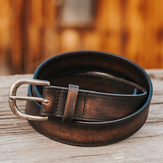 Black Distressed CLASSIC BELT featuring a rugged leather strap and a rectangular weathered silver-tone metal buckle.