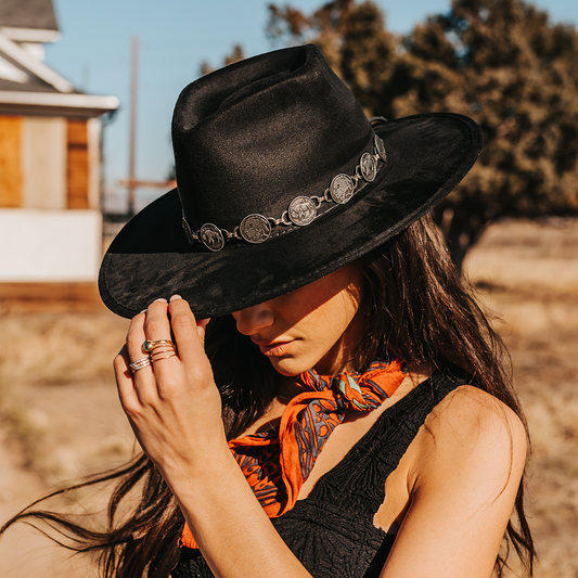 FREEBIRD Gemini black wide flat-brim hat featuring diamond-shaped crown and metal coin band