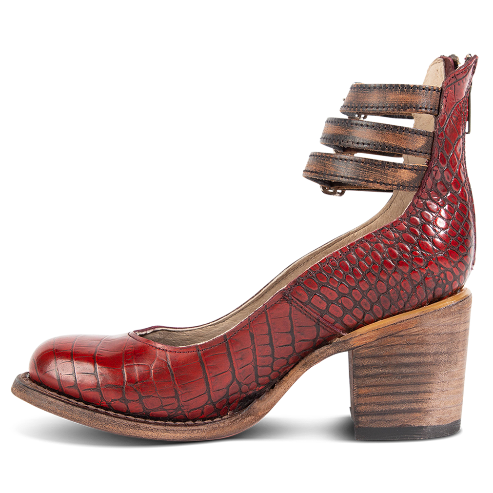 Inside view showing an open construction and wood heel with three adjustable ankle straps on FREEBIRD women’s Randi red croco leather shoe