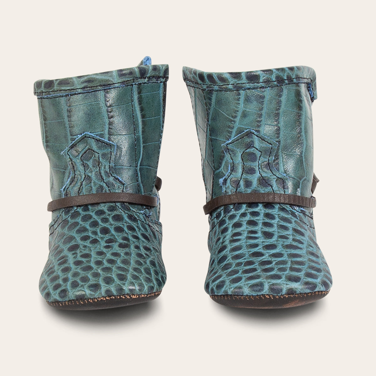 front view showing contrasting front lace detailing on FREEBIRD infant baby coal turquoise croco leather bootie  