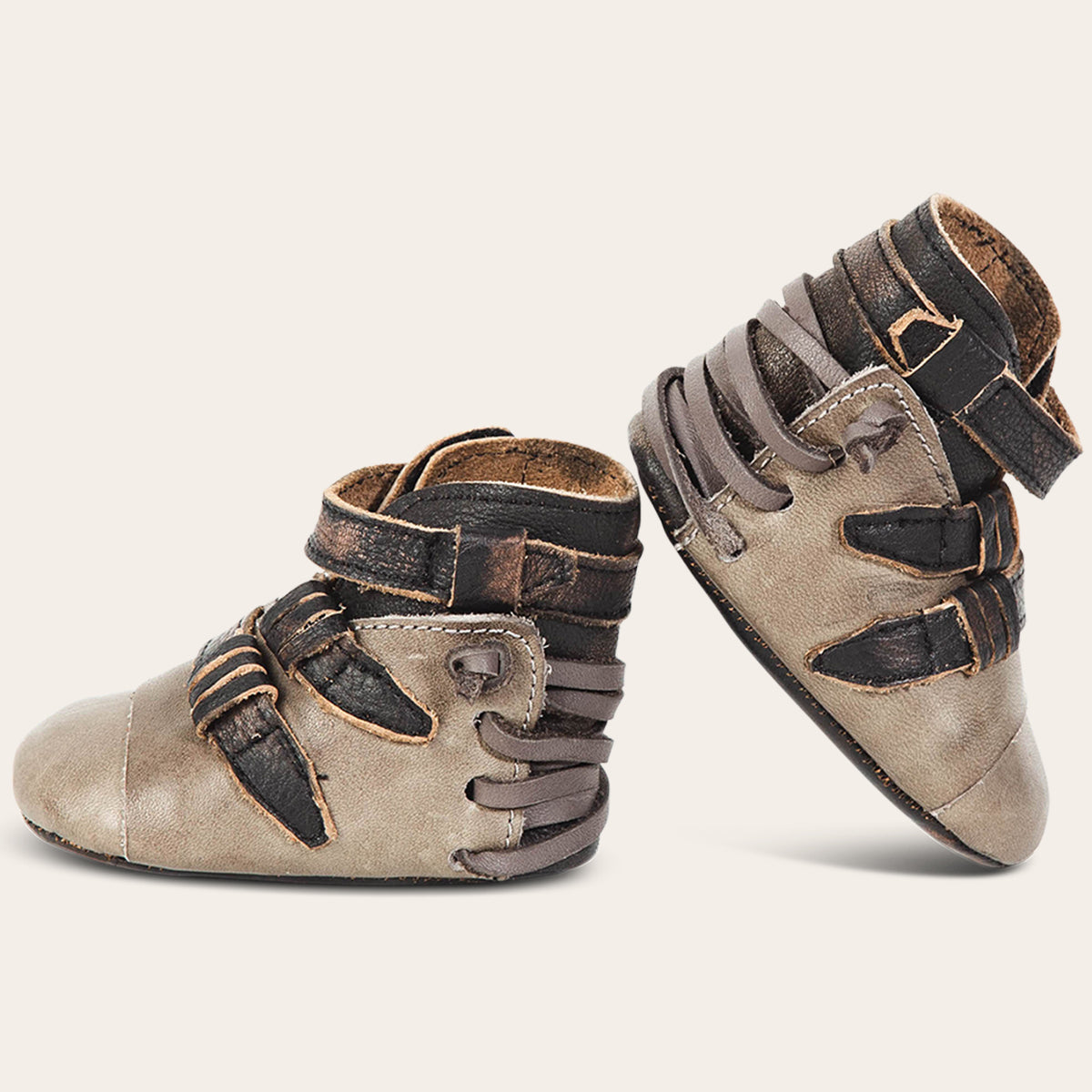 side view showing contrasting back lace and side strap detailing on FREEBIRD infant baby crue grey multi leather bootie