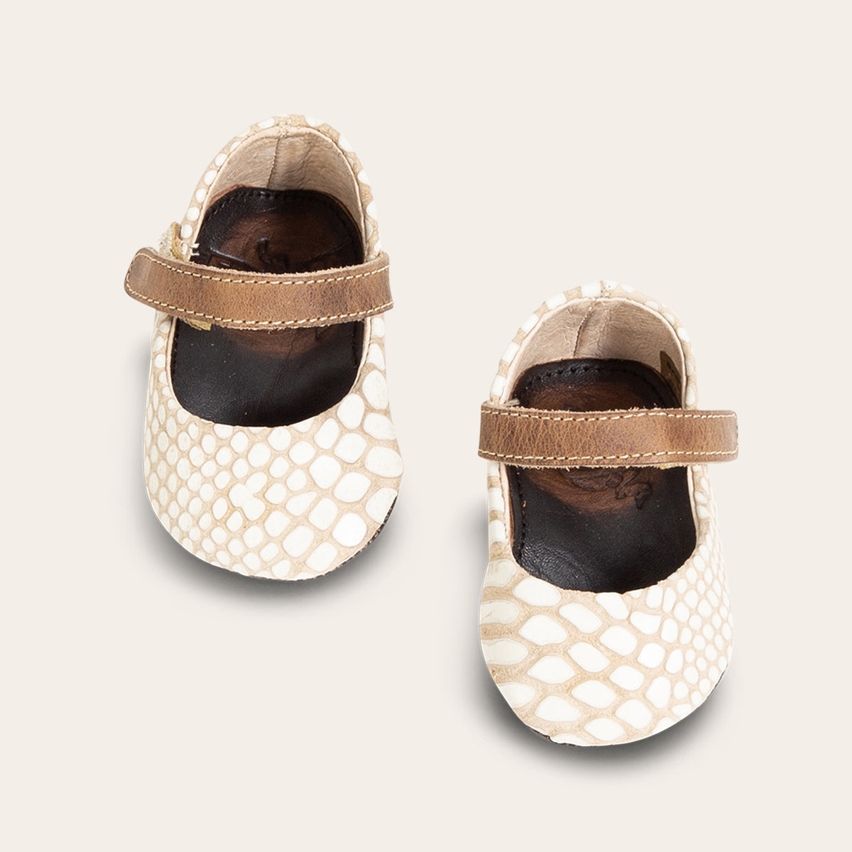 front view showing top leather strap on FREEBIRD infant baby Jane white snake leather shoe