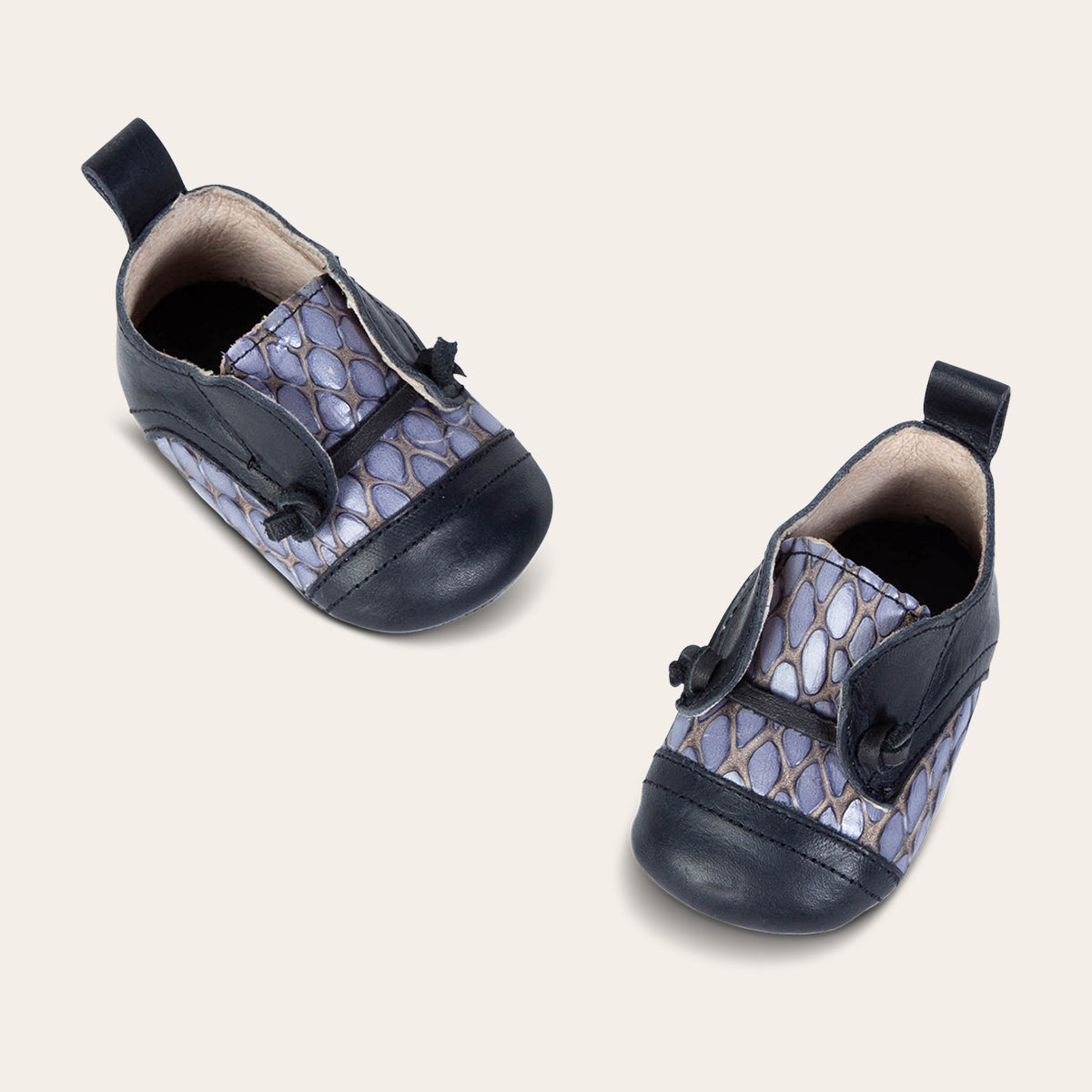 front view showing contrasting decorative knotted leather lace on FREEBIRD infant baby Mabel navy multi leather shoe