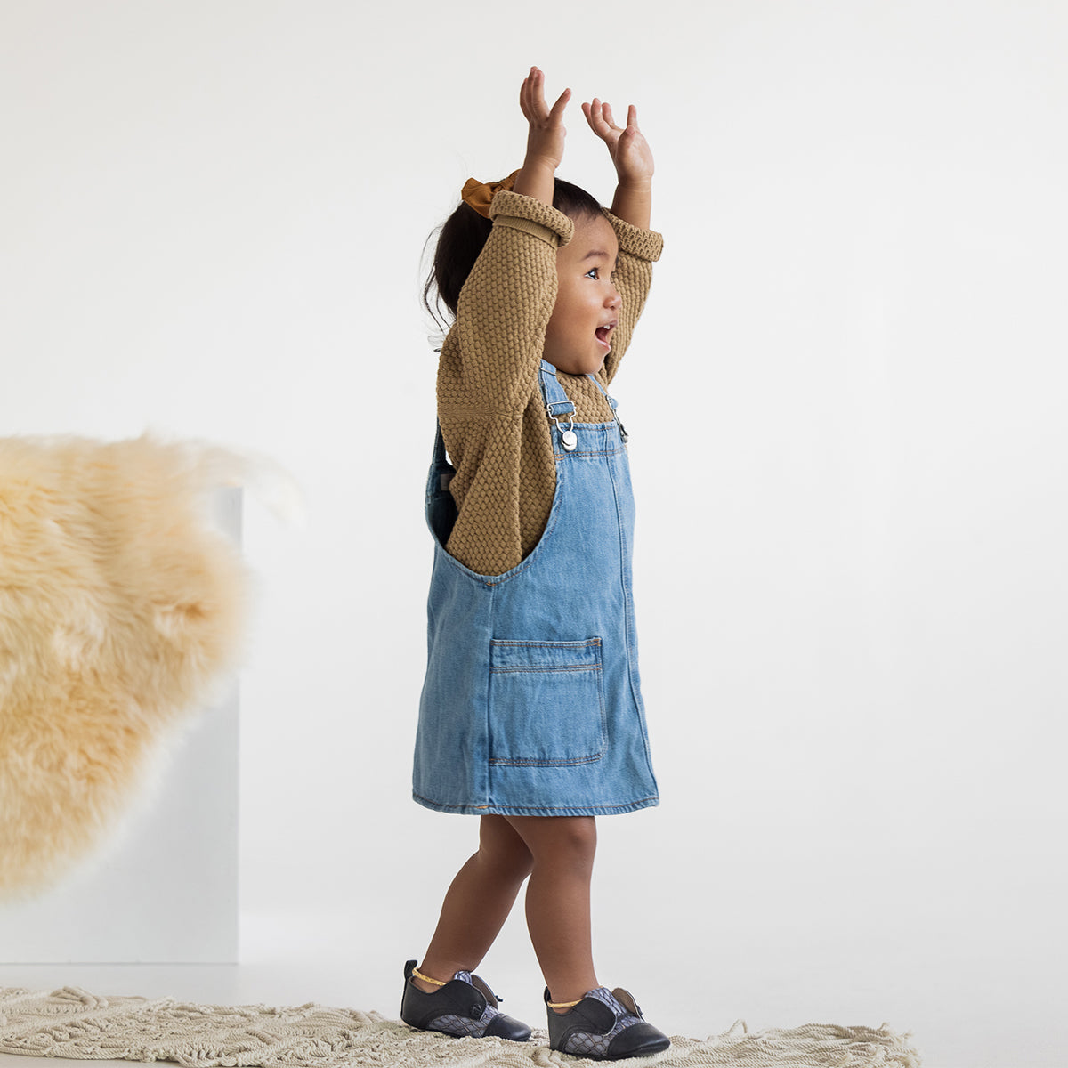 FREEBIRD infant baby Mabel navy multi leather shoe with decorative knotted leather lace and hidden inside elastic panel lifestyle image