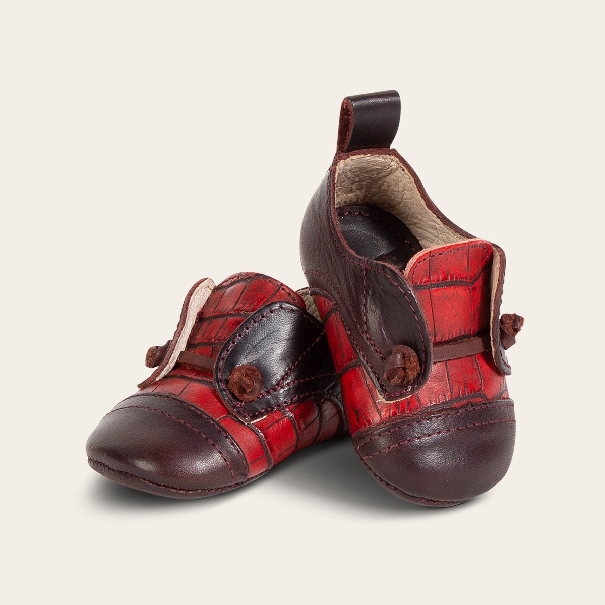 front view showing contrasting decorative knotted leather lace on FREEBIRD infant baby mabel wine multi leather shoe