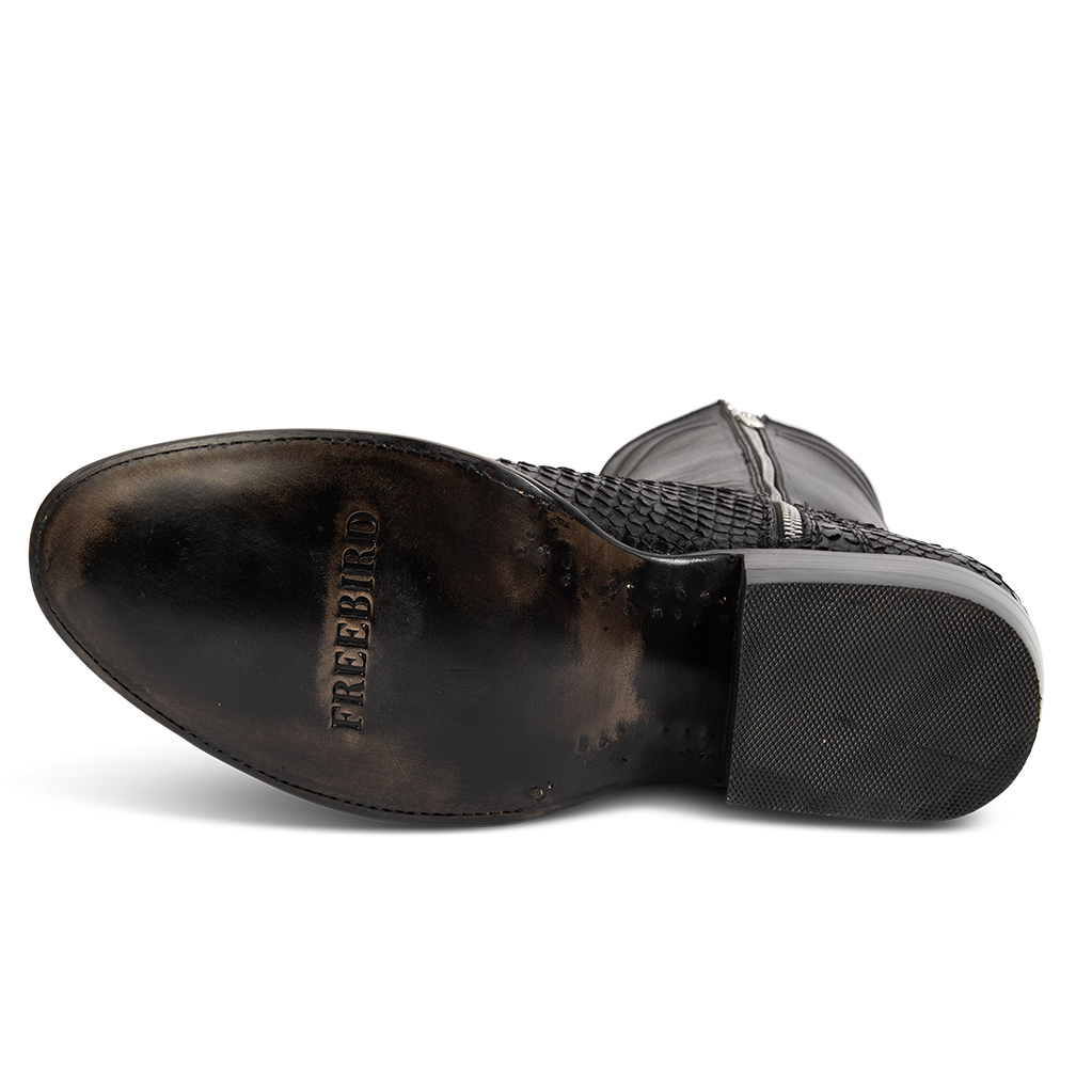 Leather sole imprinted with FREEBIRD on Alamo men's black python cowboy boot