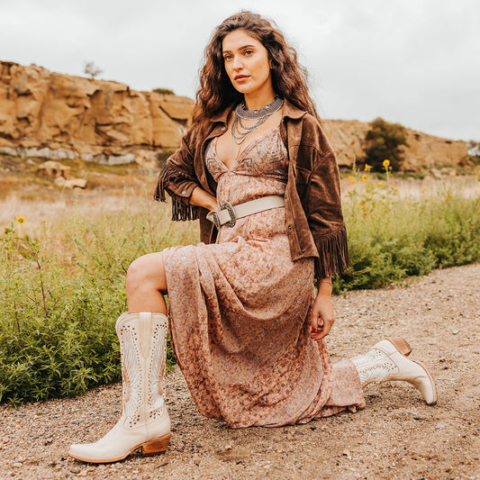 FREEBIRD women's Angel beige leather western boot with stitch wings, stud embellishments and snip toe construction lifestyle image