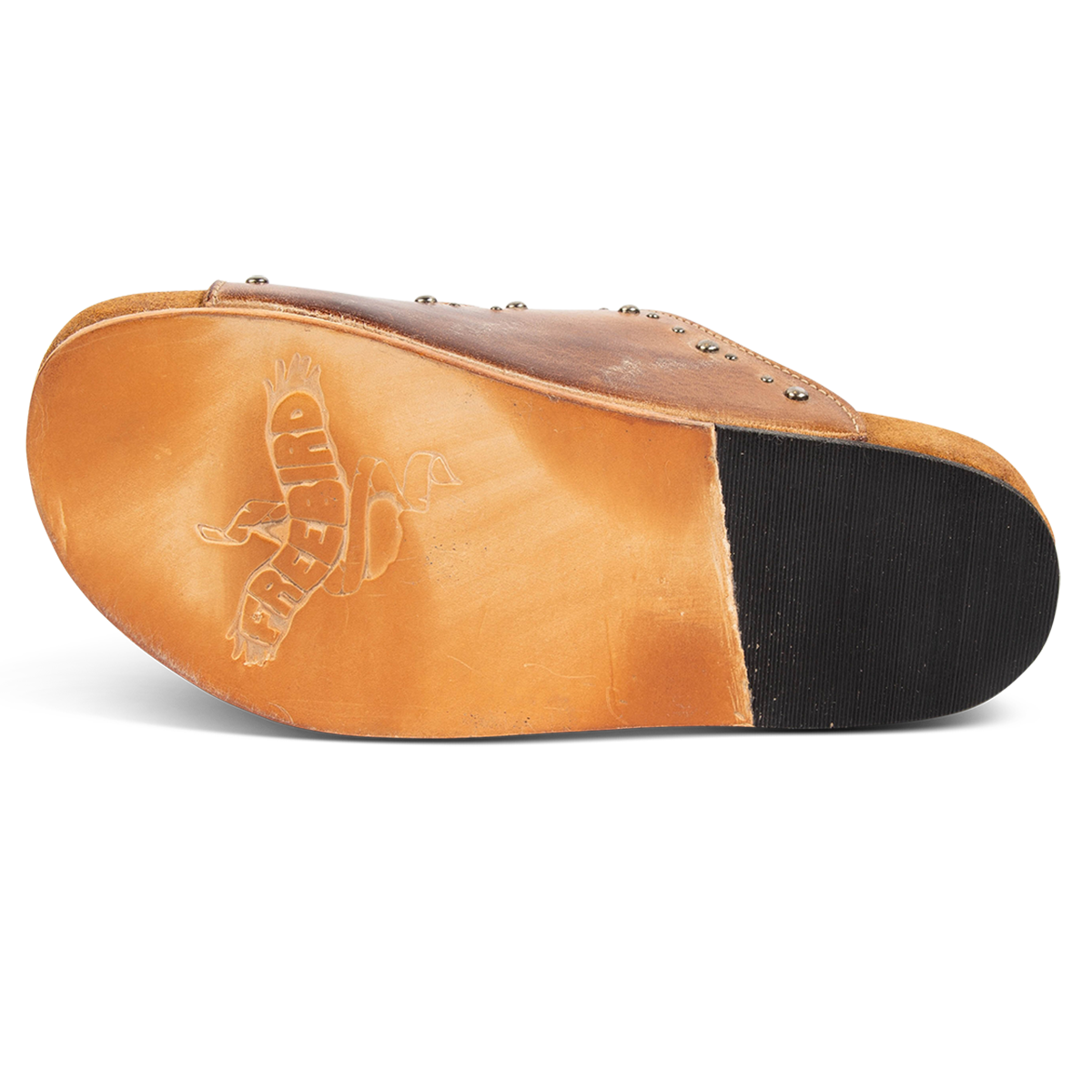 Leather sole with a tread heel imprinted with FREEBIRD on women's Asher wheat sandal