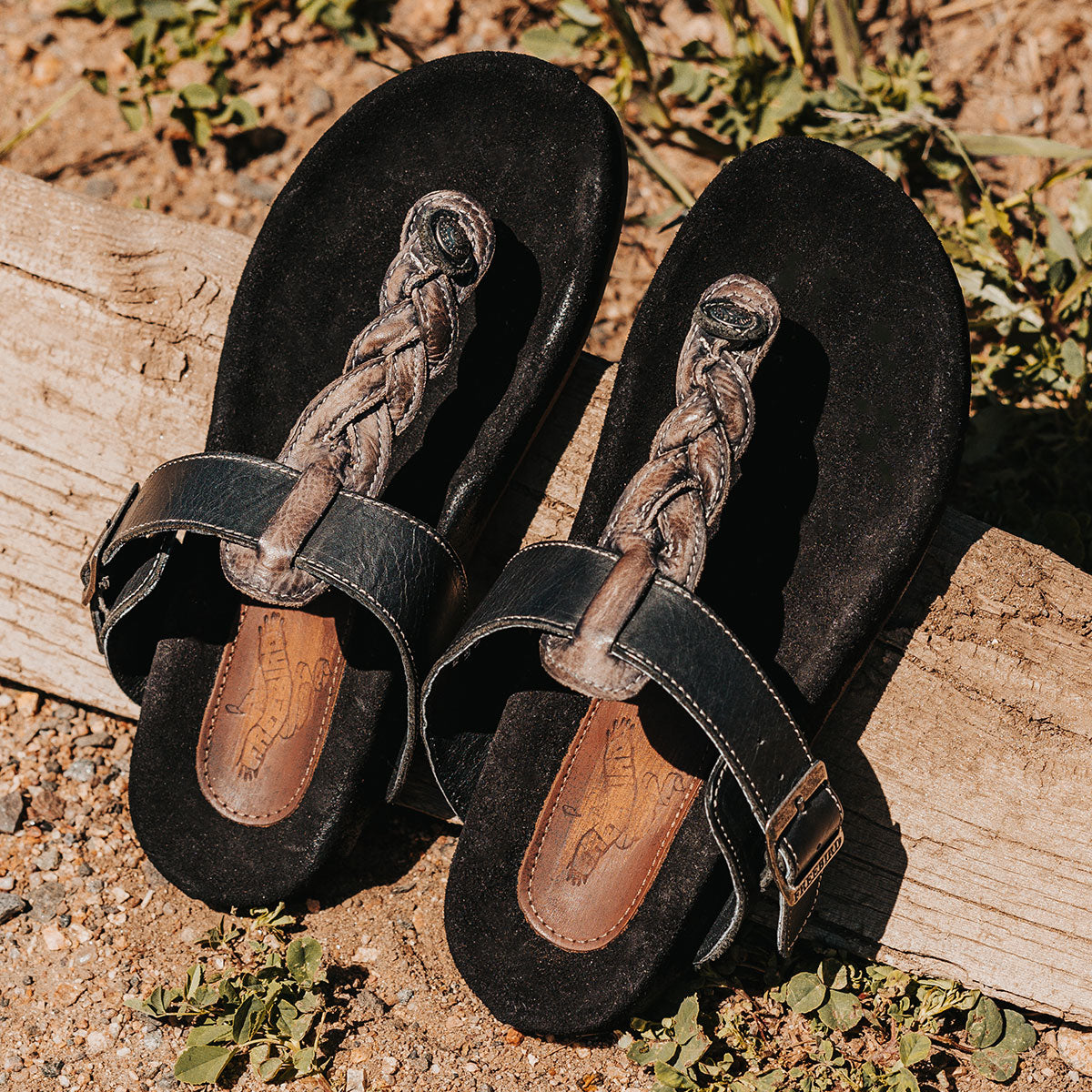 FREEBIRD women's Athena black leather/suede sandal with a braided strap, Freebird foot patch & adjustable leather strap 
