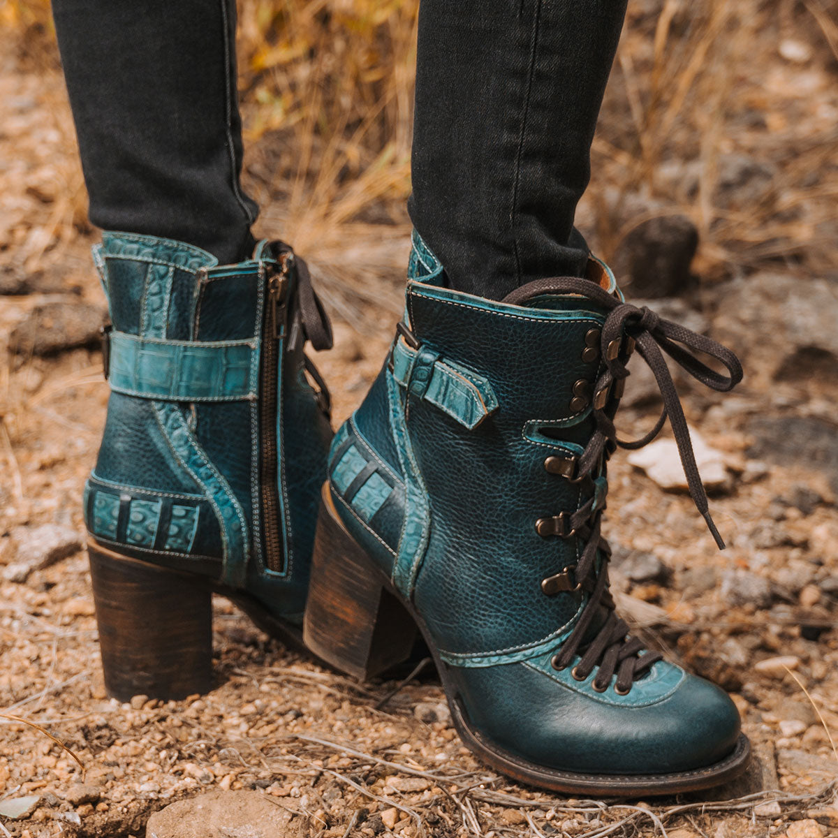 Freebird women's BANKS blue multi leather bootie with an inside working brass zipper, a tall heel and front lace up closure