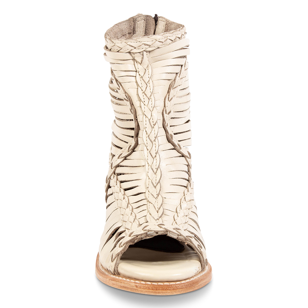 Front view showing laser cut leather, detailed braided accents and open toe construction on FREEBIRD women's Bela beige leather sandal