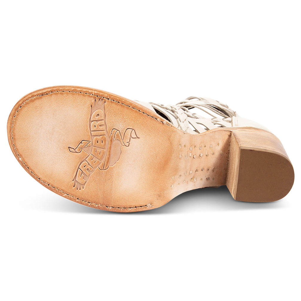 Leather sole imprinted with FREEBIRD on women's Bela beige leather sandal