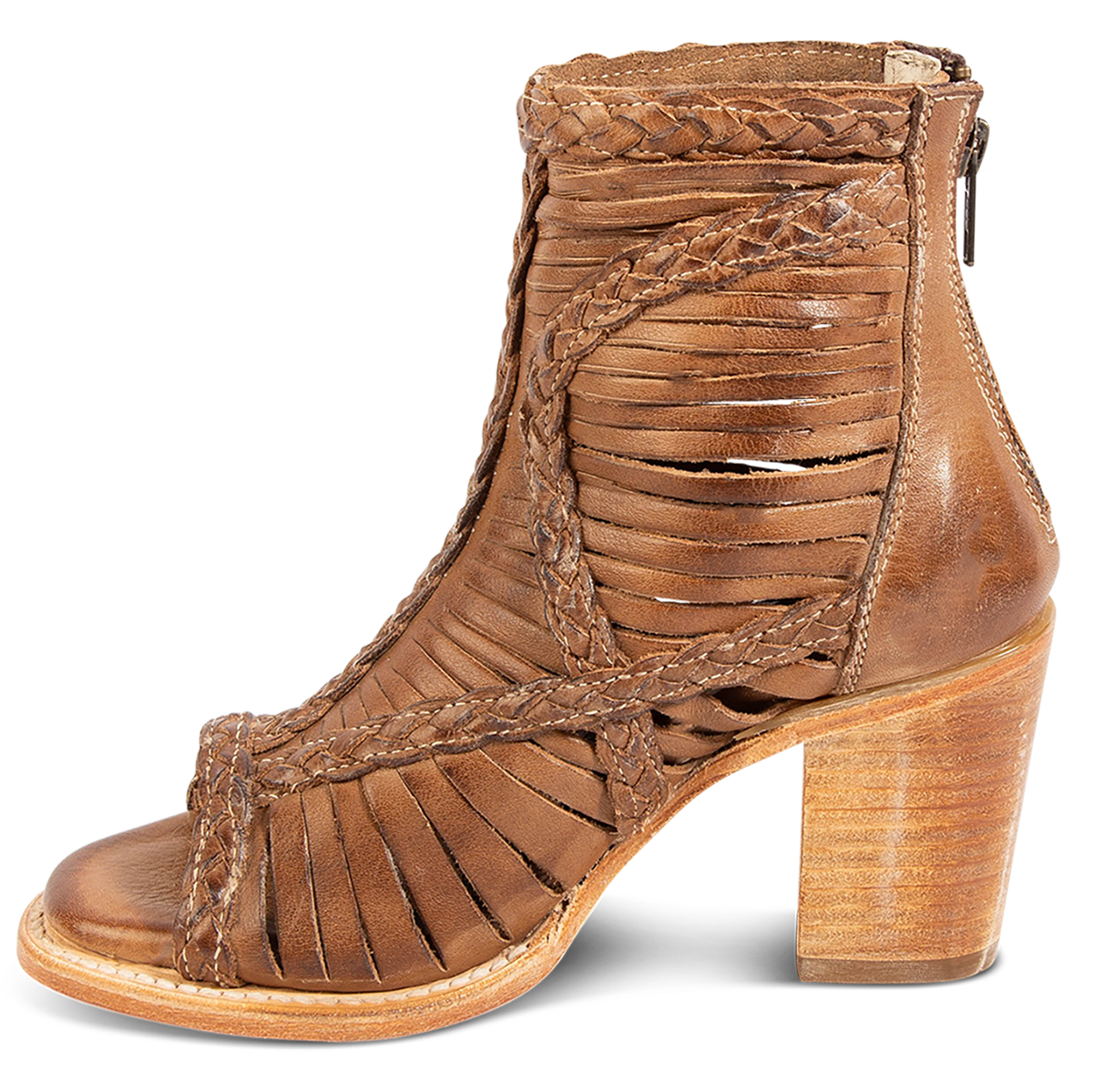 Inside view showing laser cut leather, detailed braided accents and a stacked heel on FREEBIRD women's Bela wheat leather sandal