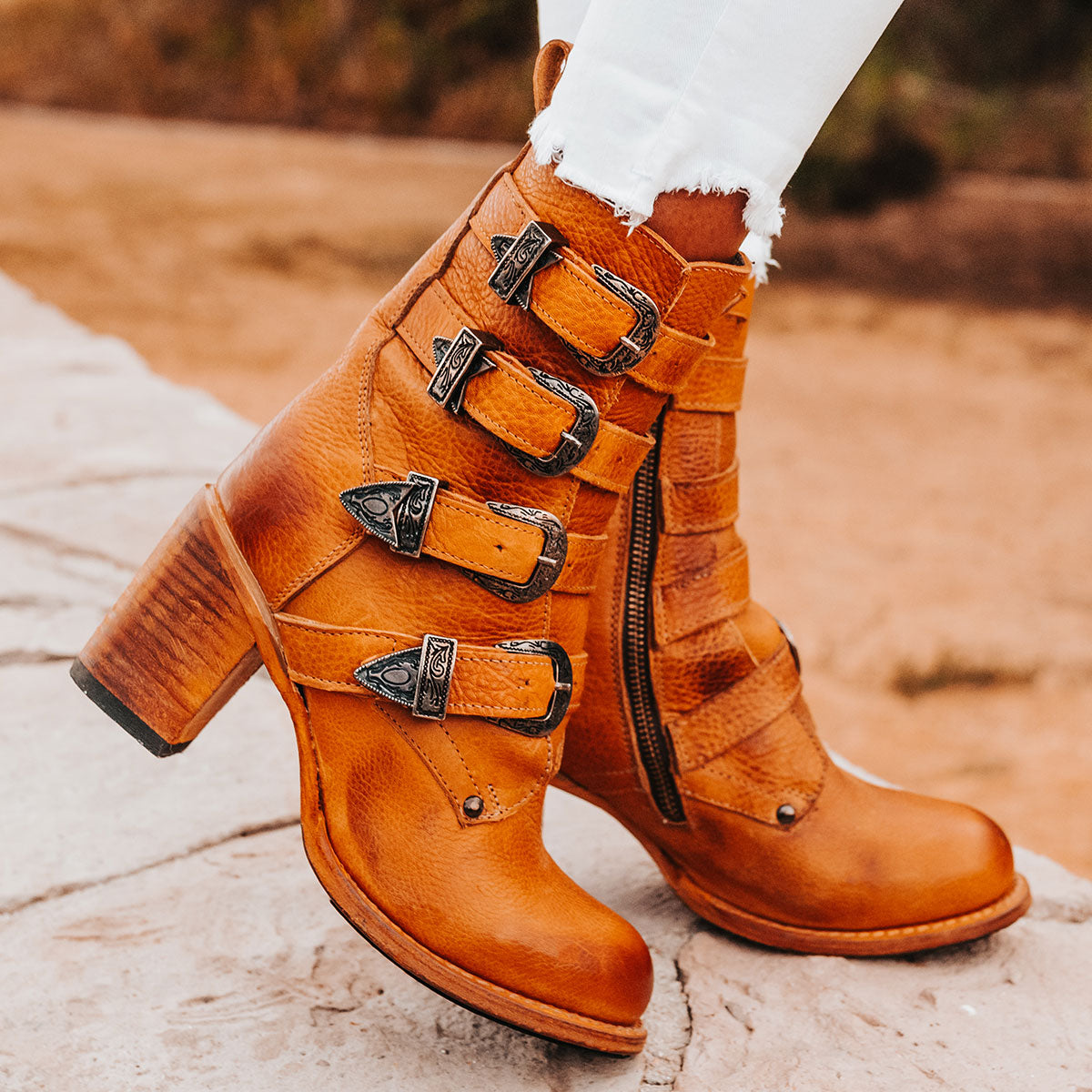 FREEBIRD women's Belladonna wheat western buckle bootie with tall heel and round toe