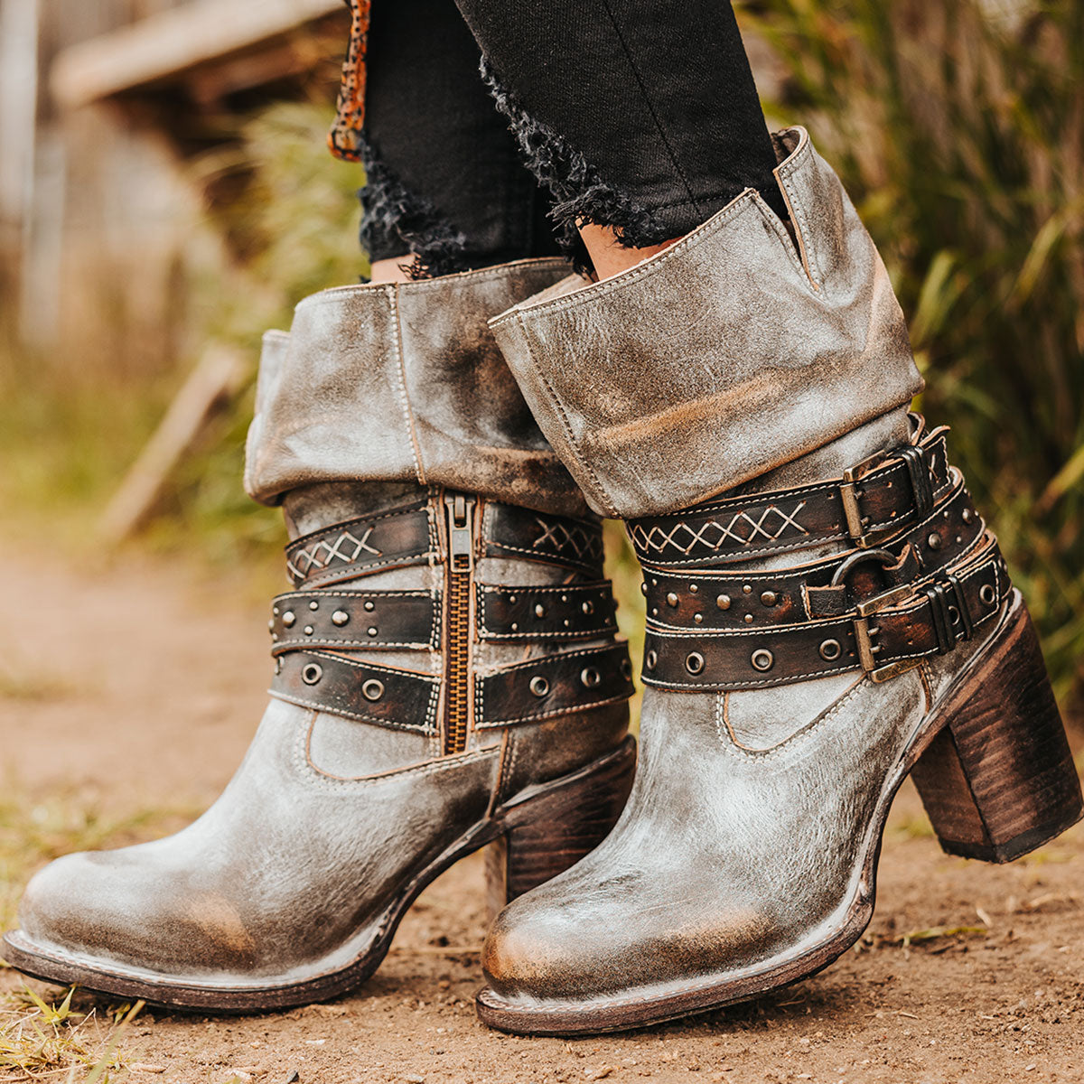 FREEBIRD women's Blaine ice leather bootie with adjustable shaft belts, round toe construction and inside working zipper