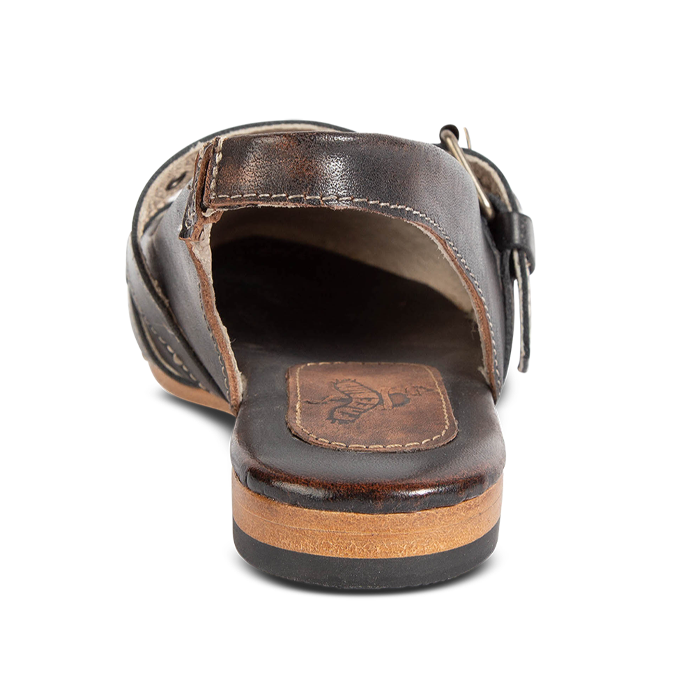 Back view showing low heel on FREEBIRD women's Blair black sling back ballet flat shoe featuring adjustable buckle and soft pointed toe