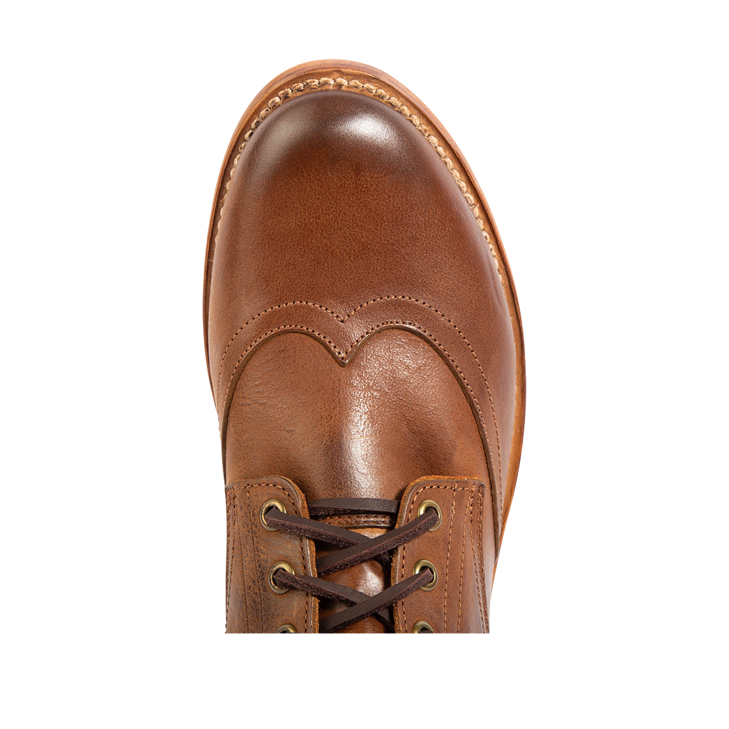 Top view showing an almond toe, leather front lacing and stitch detailing on FREEBIRD men's Bodie brown leather boot