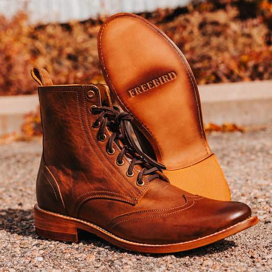 FREEBIRD men's Bodie brown leather boot with a full-grain leather body, a Goodyear welt, and functional leather front lacing ties